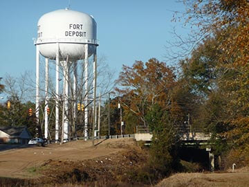 Large water tower with Fort Deposit written on it