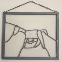 Line drawing of stylized horse in clear glass