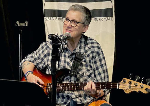 Lenny Lassiter playing guitar.