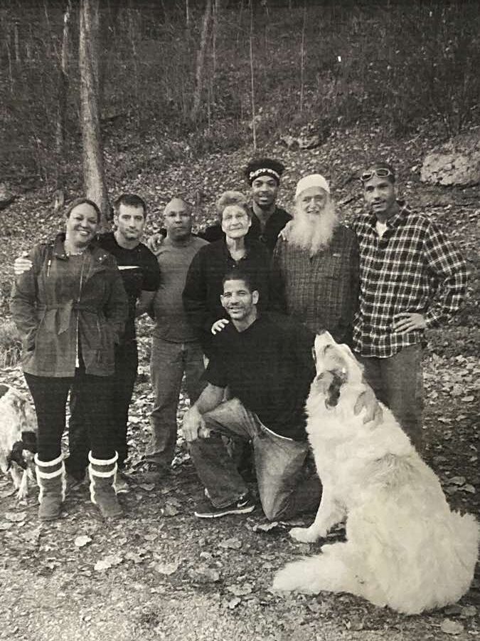 Ananda, Jesse, J'aime, Merril Mushroom, CJ, John, David, and kneeling in front right Scott with dog in 2018