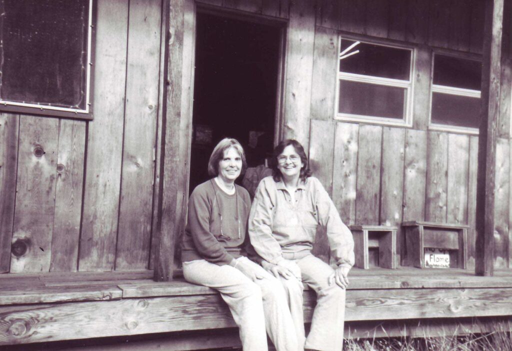 shewolf and friend on the porch of the old Rootworks office