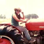 Corky 1975-6-2 kathleen on tractor, Pat Paul photo OPT