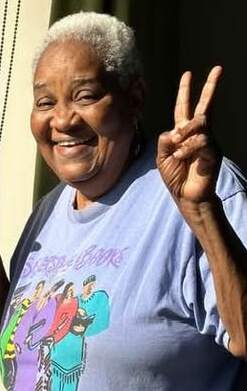 Faye Williams making peace sign
