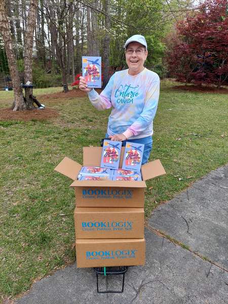 Leaf with boxes of her book Where Risky Women Travel