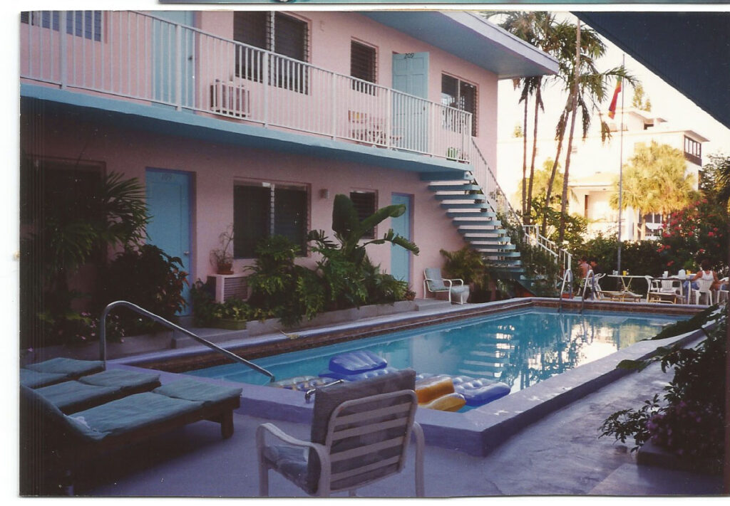 Swimming pool is in courtyard between two wings of the motel